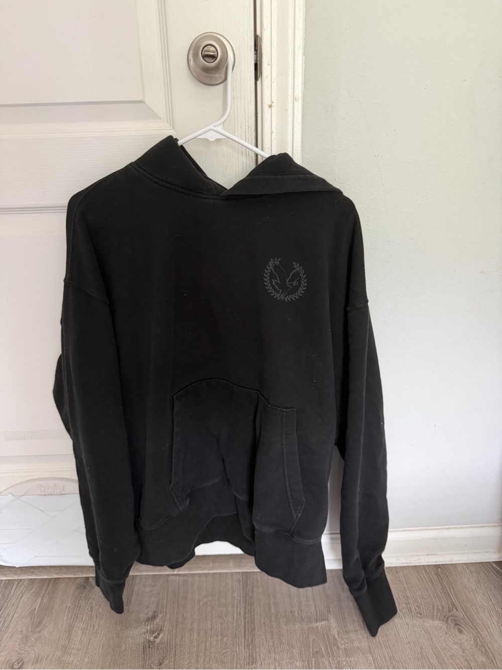 American Eagle Outfitters Black Pullover Hoodie with Subtle Chest Emblem